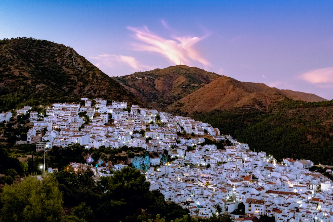 White village buildings and evening lights in Andalusia