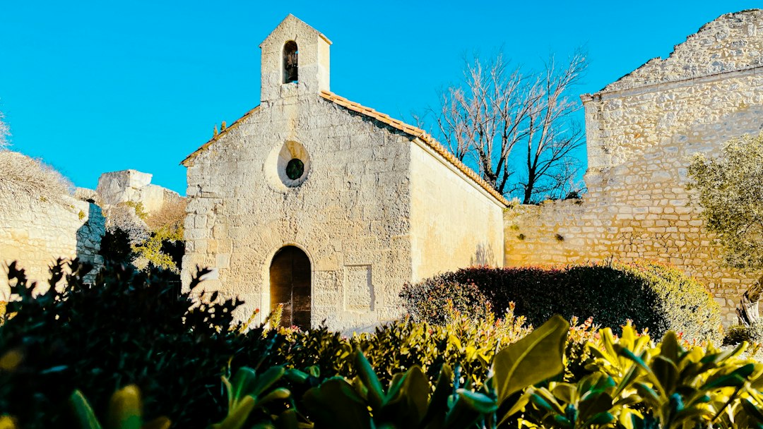 Traditional stone church and greenery in a Mallorcan village