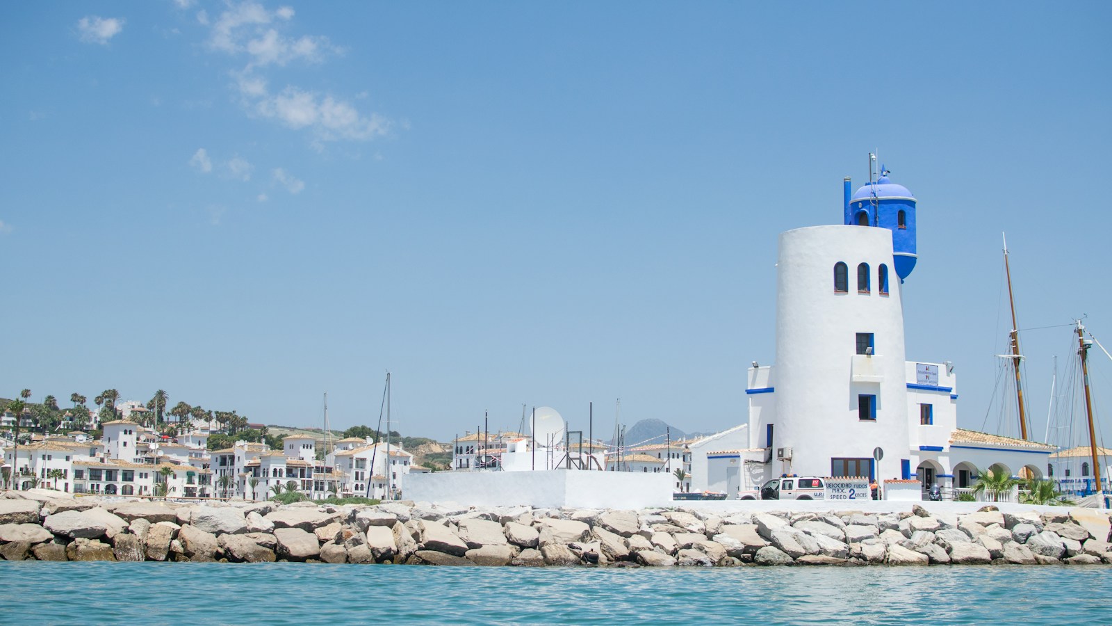 Harbour tower and marina atmosphere on the Costa del Sol near Castillo de la Duquesa