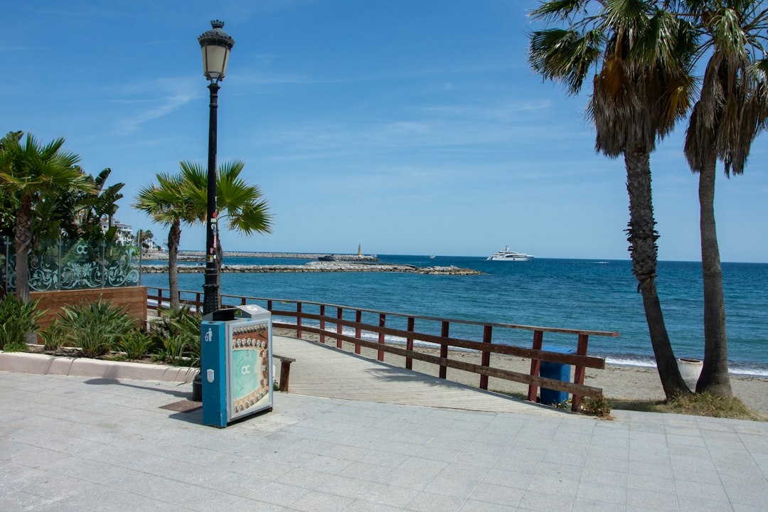 Sunny beach promenade and Mediterranean views on the Costa del Sol