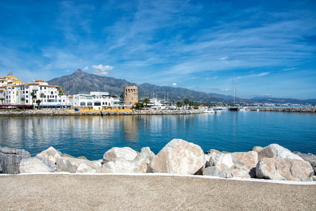 White coastal buildings and marina along the Costa del Sol in southern Spain